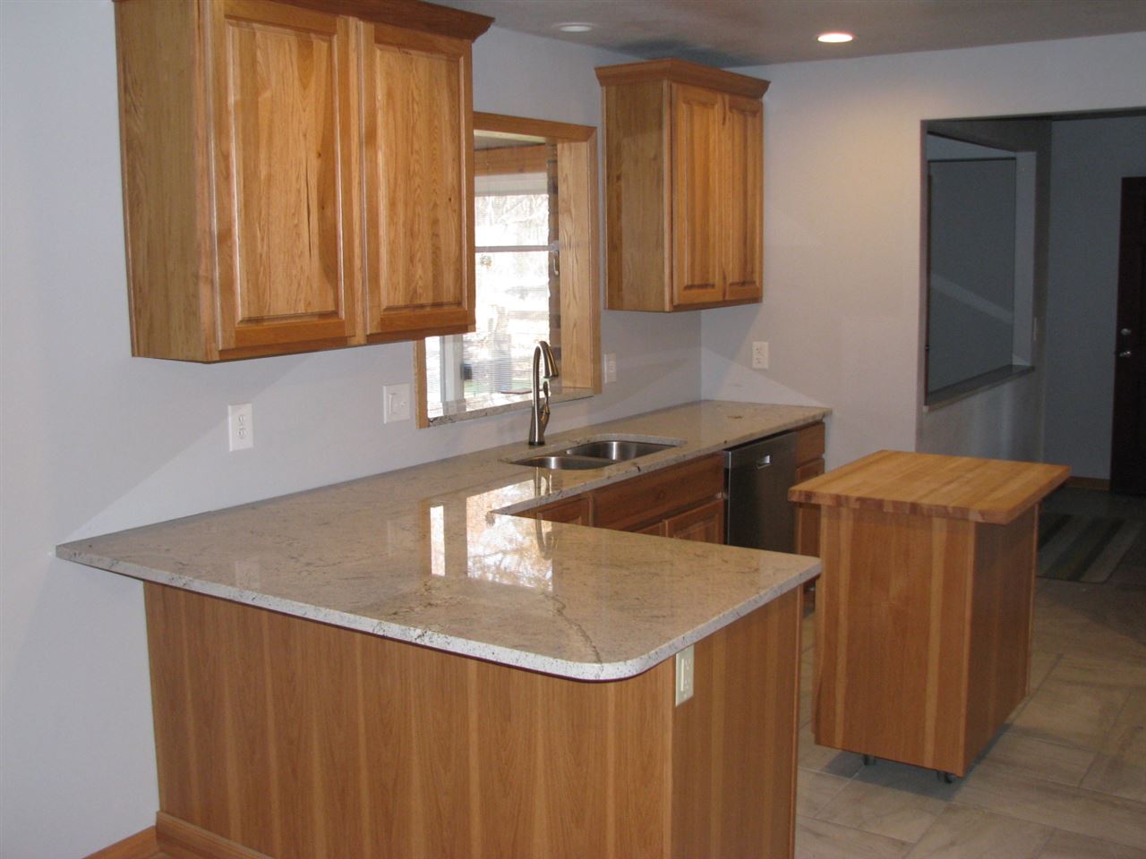 1152 Middle Road South Beloit, IL 61080 - Photo 15 of 24 a kitchen with a sink a cabinets and window