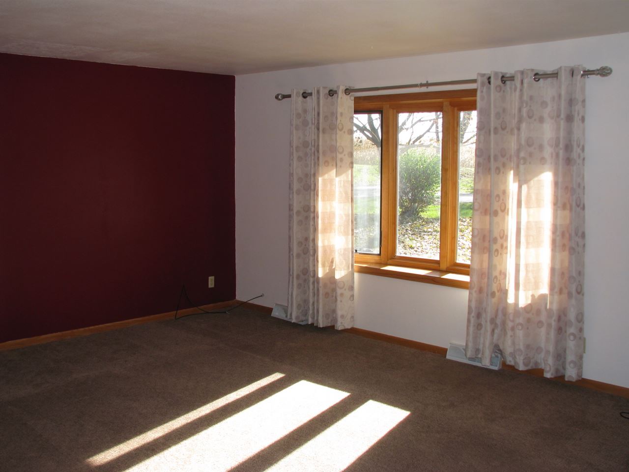 1152 Middle Road South Beloit, IL 61080 - Photo 2 of 24 a view of an empty room and window