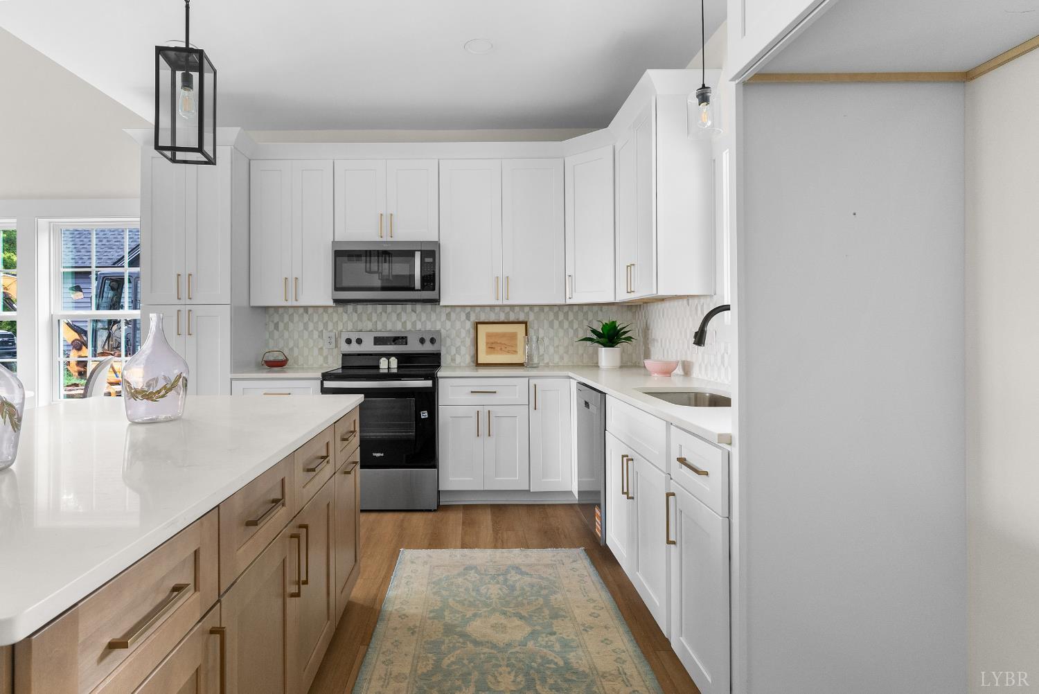 6 Wirtz Road Wirtz, VA 24184 - Photo 13 of 56 a kitchen with white cabinets and appliances