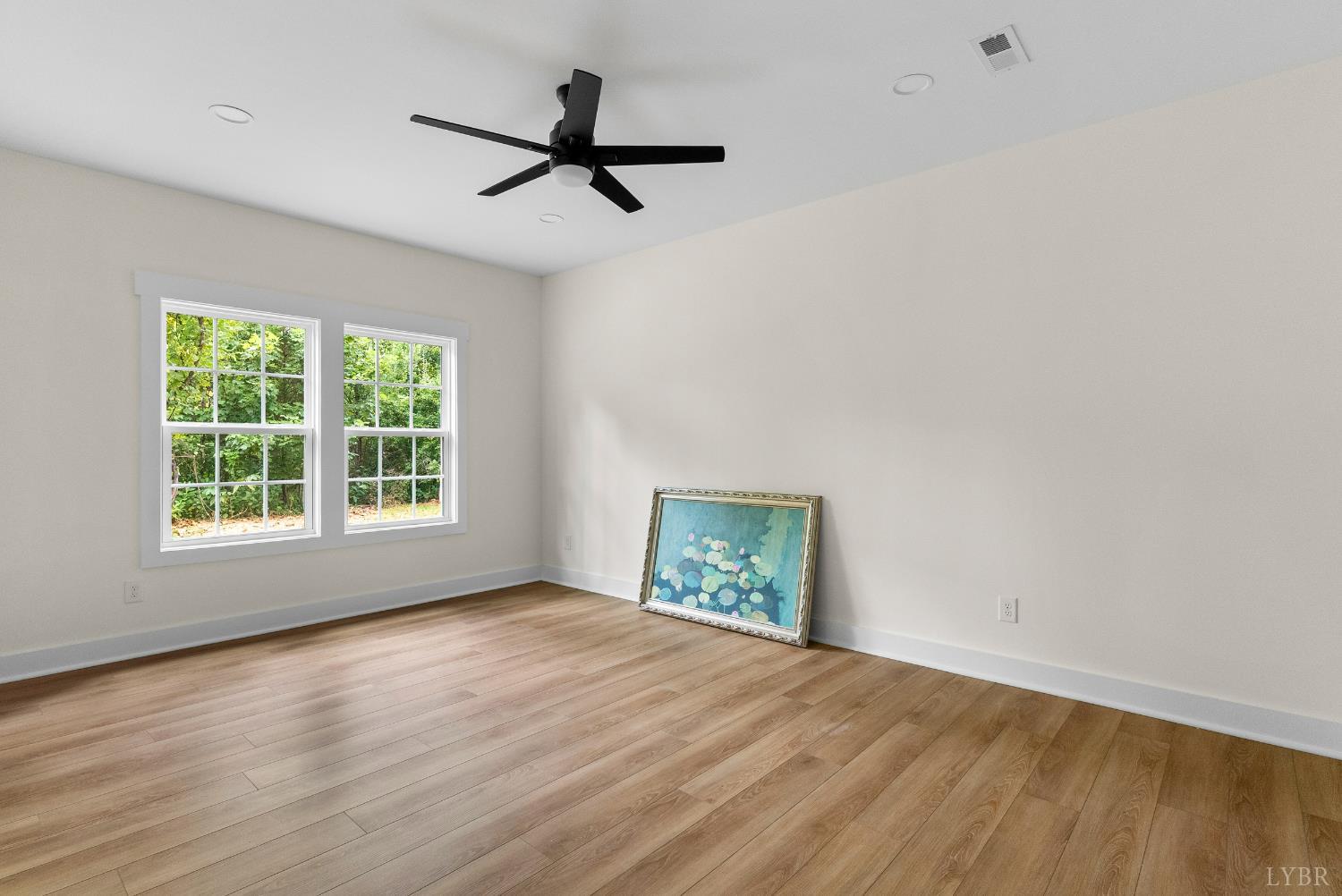6 Wirtz Road Wirtz, VA 24184 - Photo 35 of 56 a view of empty room with wooden floor and fan
