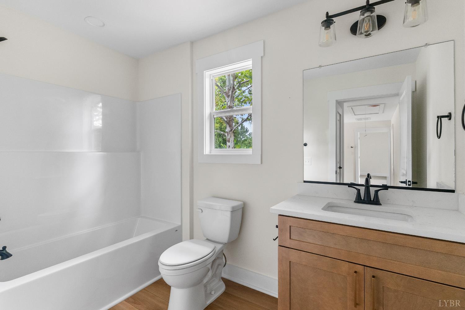 6 Wirtz Road Wirtz, VA 24184 - Photo 38 of 56 a bathroom with a sink a toilet and a bathtub