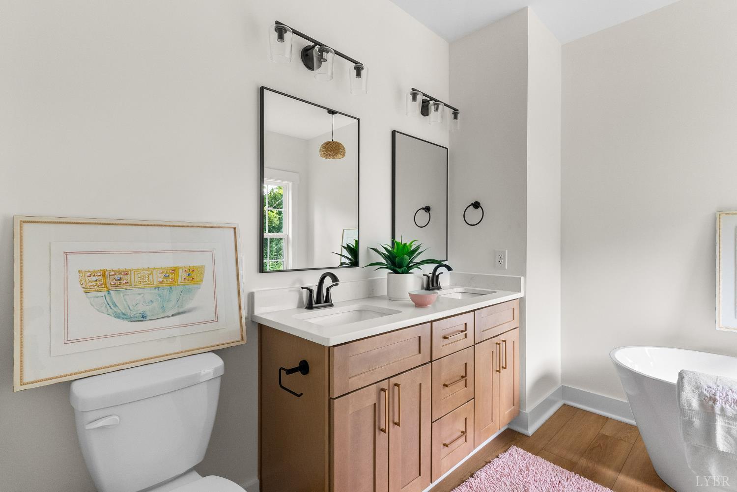 6 Wirtz Road Wirtz, VA 24184 - Photo 41 of 56 a bathroom with a toilet a sink and mirror