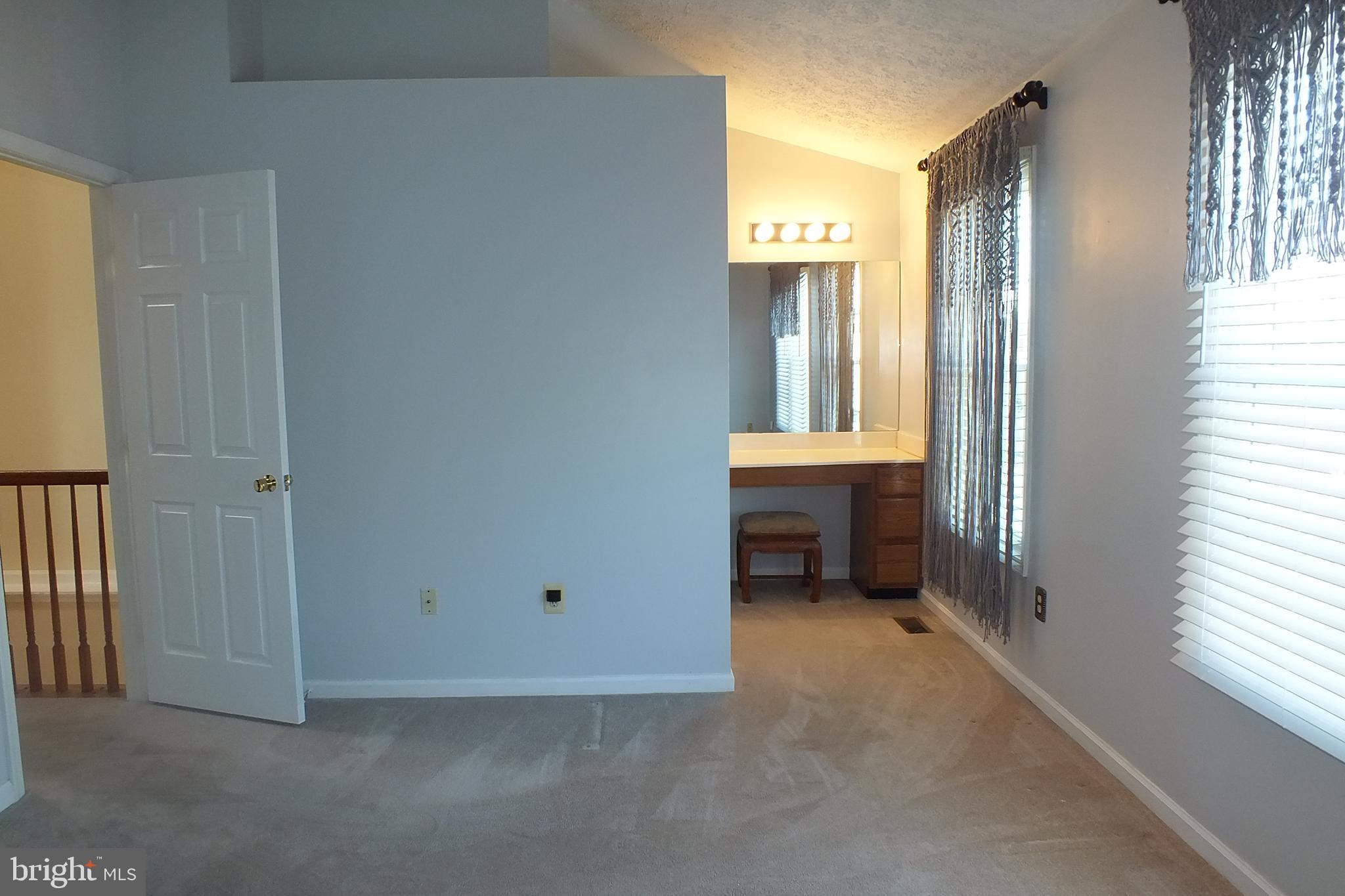 21 Cedarcone Court Nottingham, MD 21236 - Photo 11 of 38 an empty room with windows