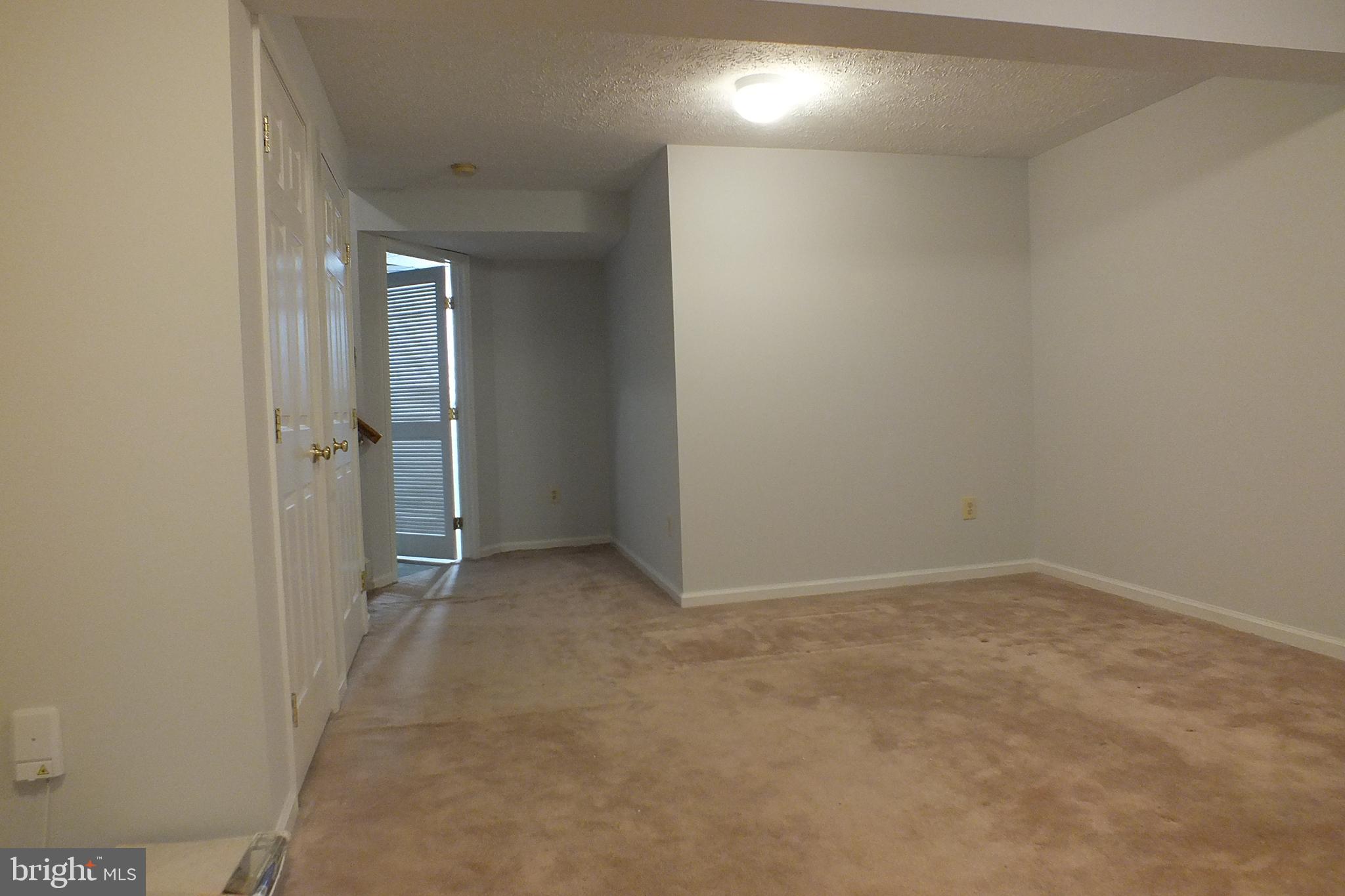 21 Cedarcone Court Nottingham, MD 21236 - Photo 13 of 38 an empty room with windows