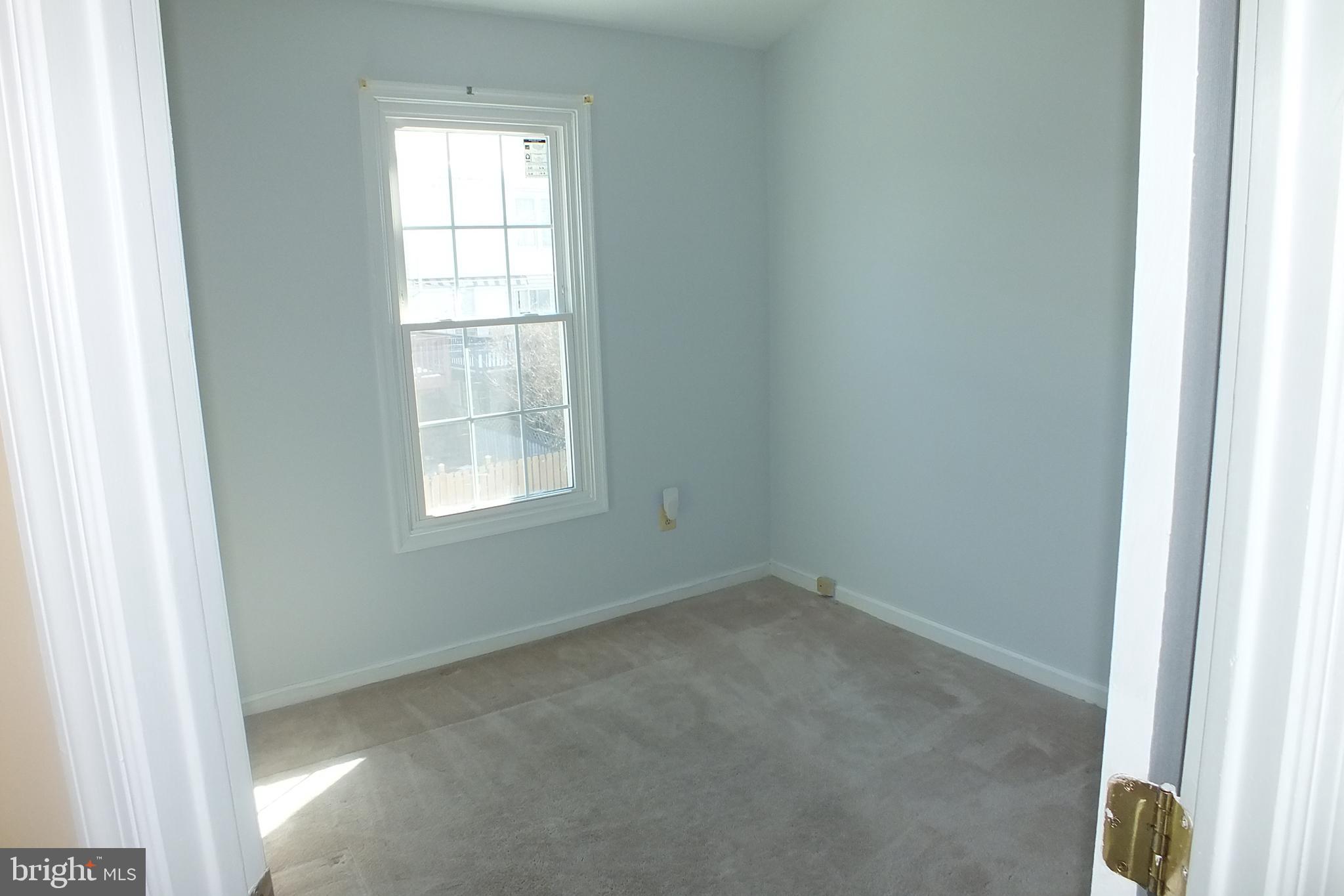 21 Cedarcone Court Nottingham, MD 21236 - Photo 16 of 38 an empty room with windows