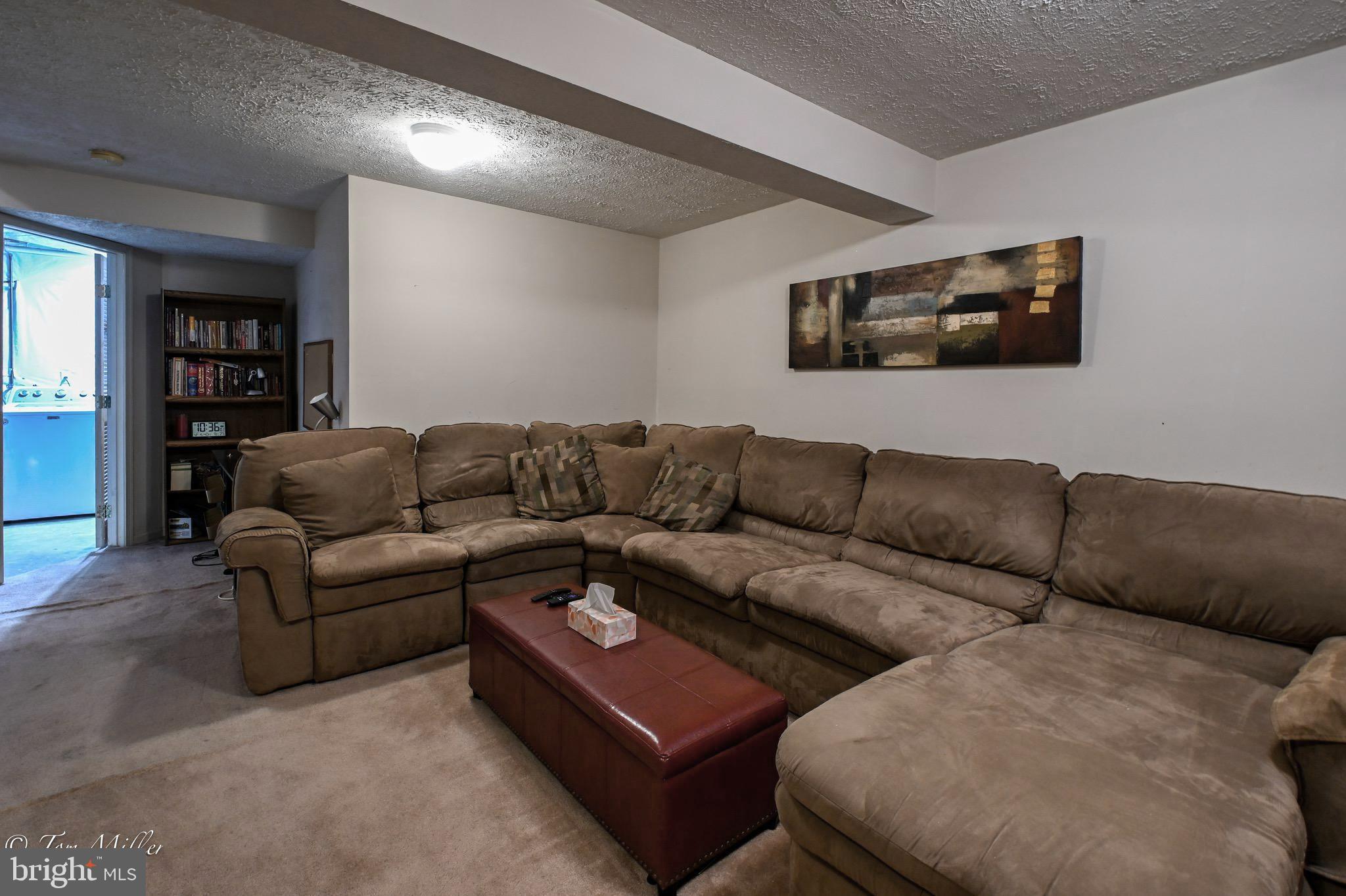 21 Cedarcone Court Nottingham, MD 21236 - Photo 29 of 38 a living room with furniture and a couch