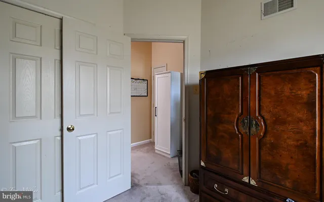 a view of a elevator and an empty room