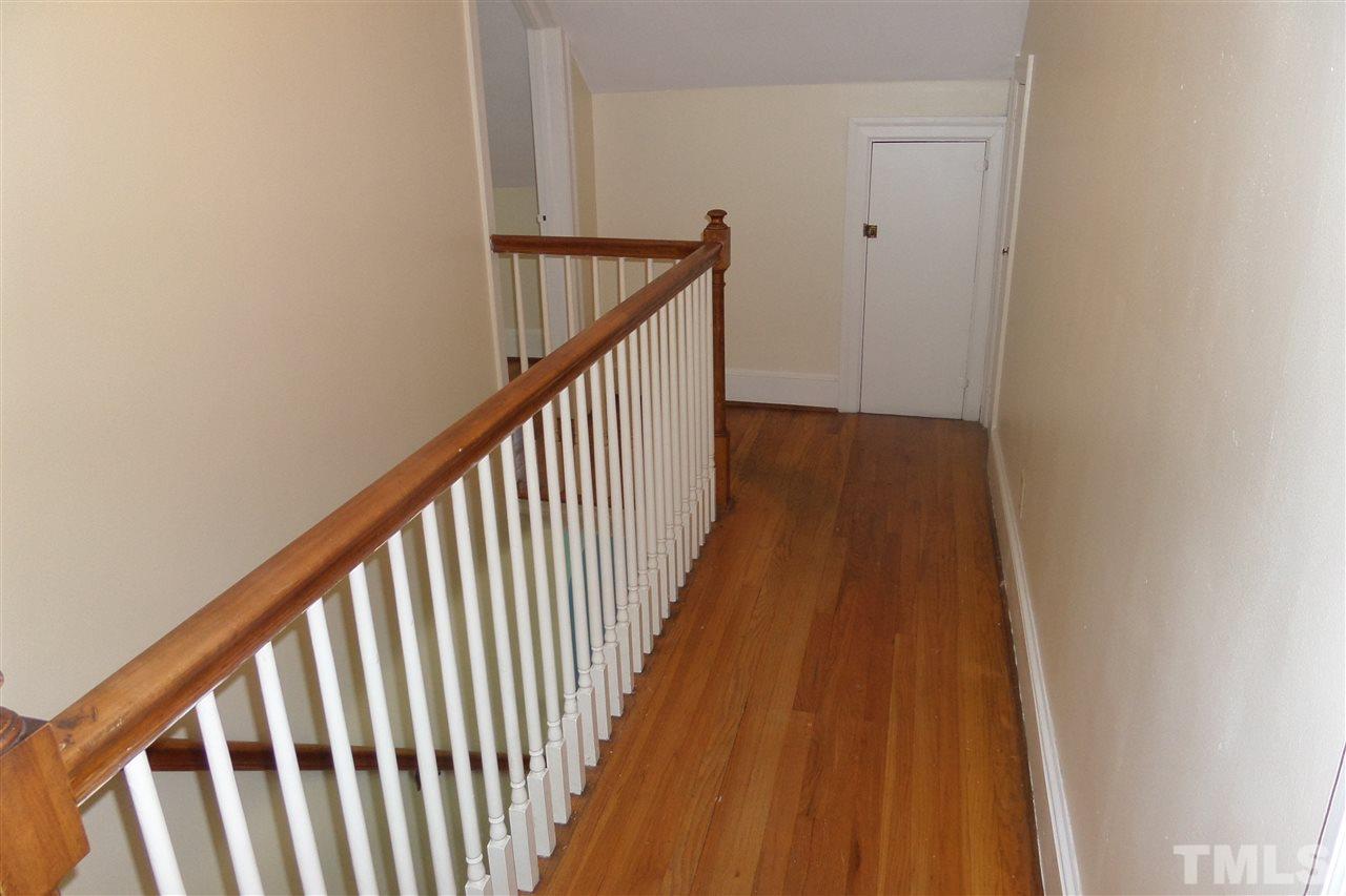 1102 East Martin Street Raleigh, NC 27610 - Photo 19 of 21 a view of a balcony with wooden floor
