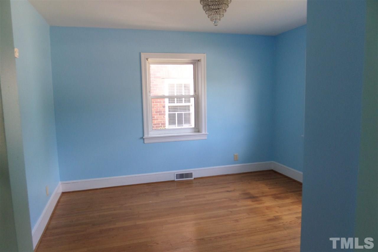 1102 East Martin Street Raleigh, NC 27610 - Photo 8 of 21 an empty room with a window