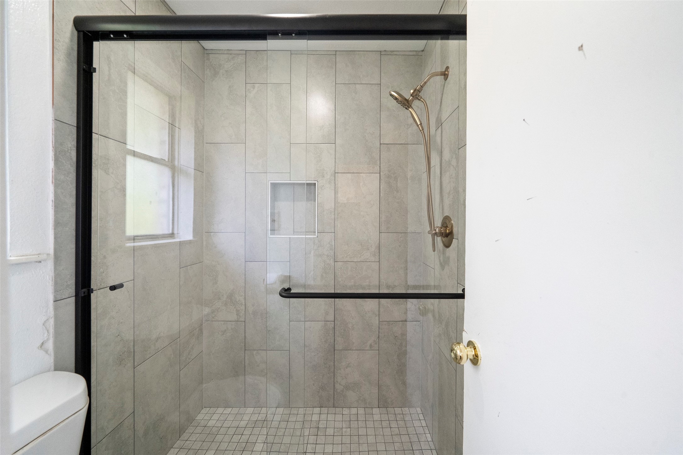 5726 Yorkgate Drive Spring, TX 77373 - Photo 16 of 22 a bathroom with a shower and a toilet
