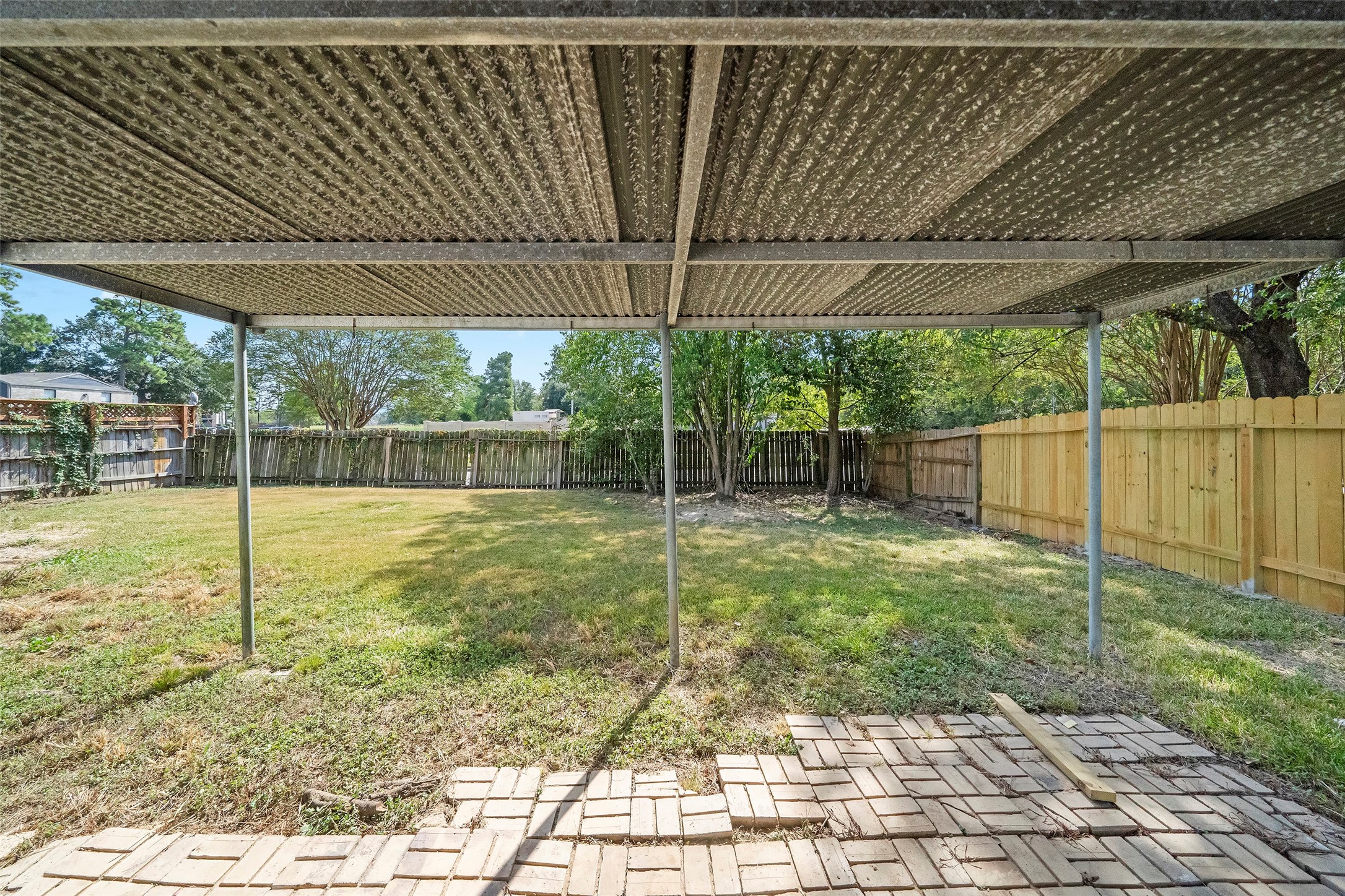 5726 Yorkgate Drive Spring, TX 77373 - Photo 20 of 22 a view of a backyard with a garden