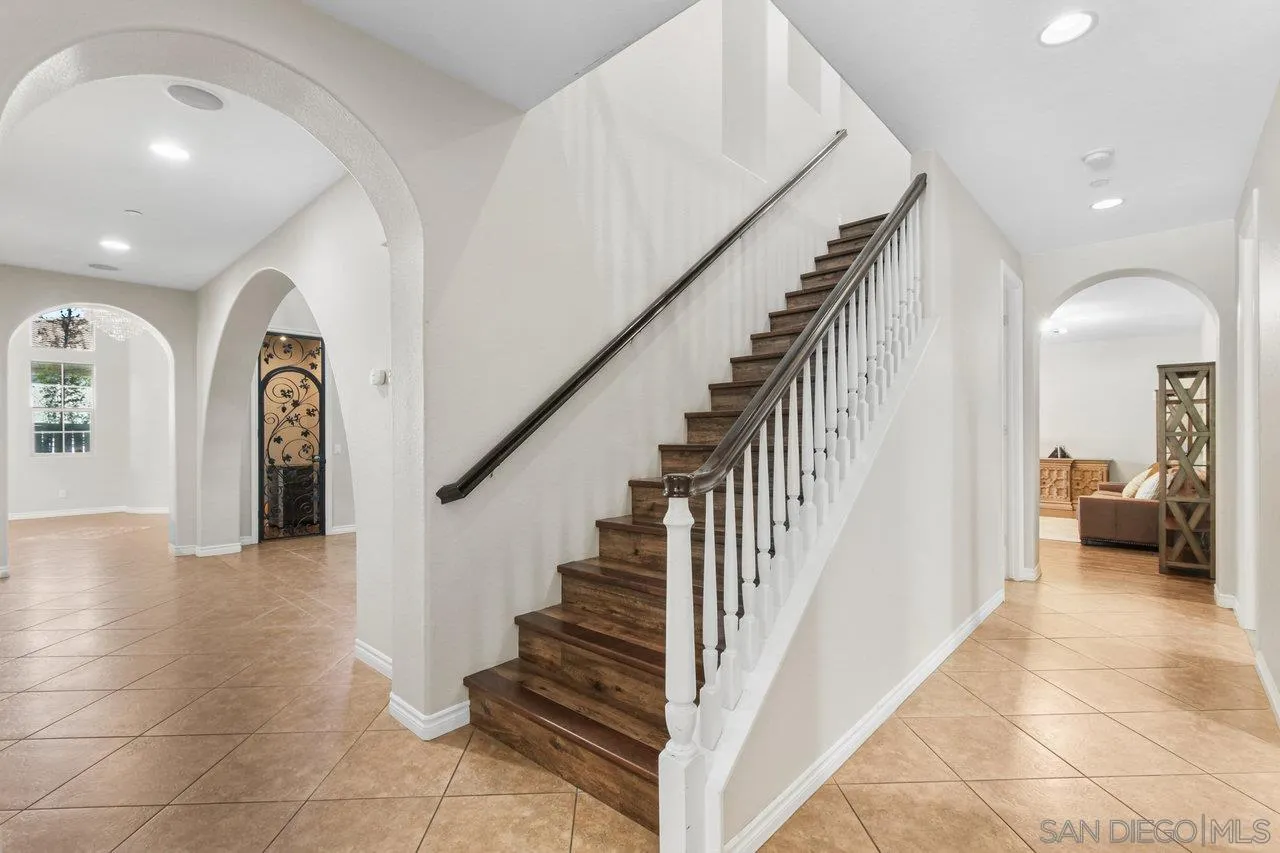2957 Ranch Gate Road Chula Vista, CA 91914 - Photo 19 of 75 a view of entryway and hall with wooden floor