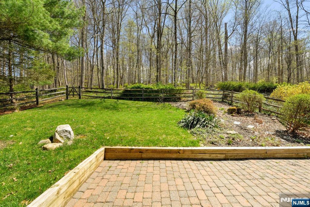 64 Hilltop Trail Sparta, NJ 07871 - Photo 37 of 40 a backyard of a house with lots of green space
