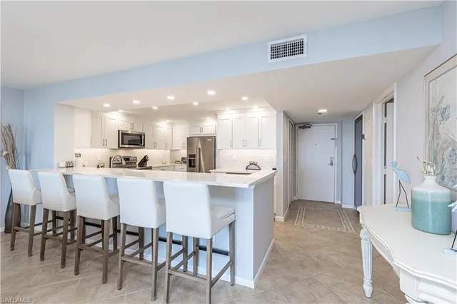 $12,000 | 11030 Gulf Shore Drive, Unit 901, Naples, FL 34108