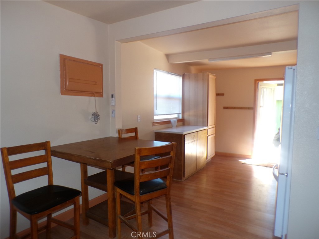 16183 18th Avenue Clearlake, CA 95422 - Photo 14 of 21 a view of a dining room with furniture and wooden floor