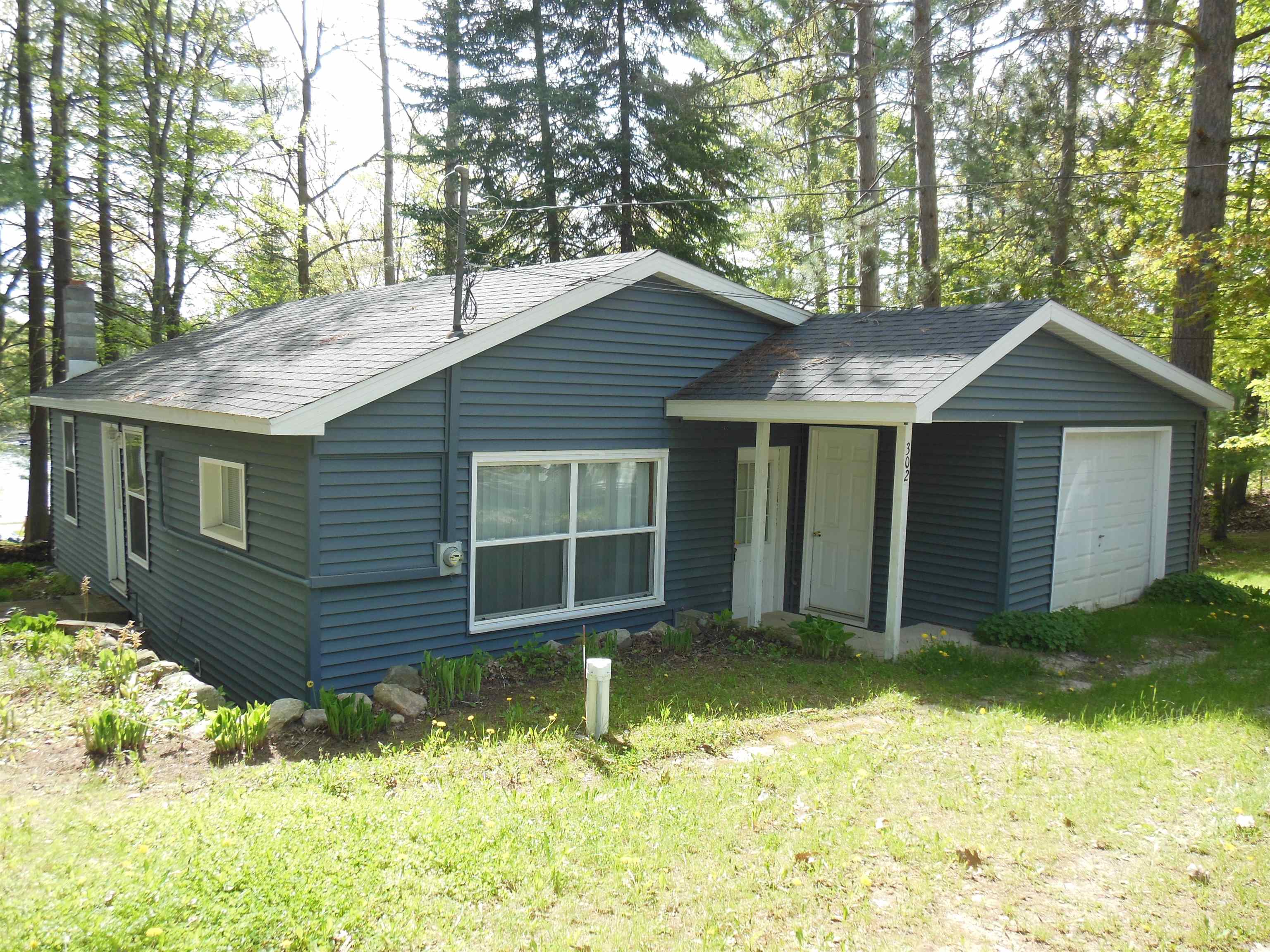 302 Ridge Road Harrison, MI 48625 - Photo 1 of 31