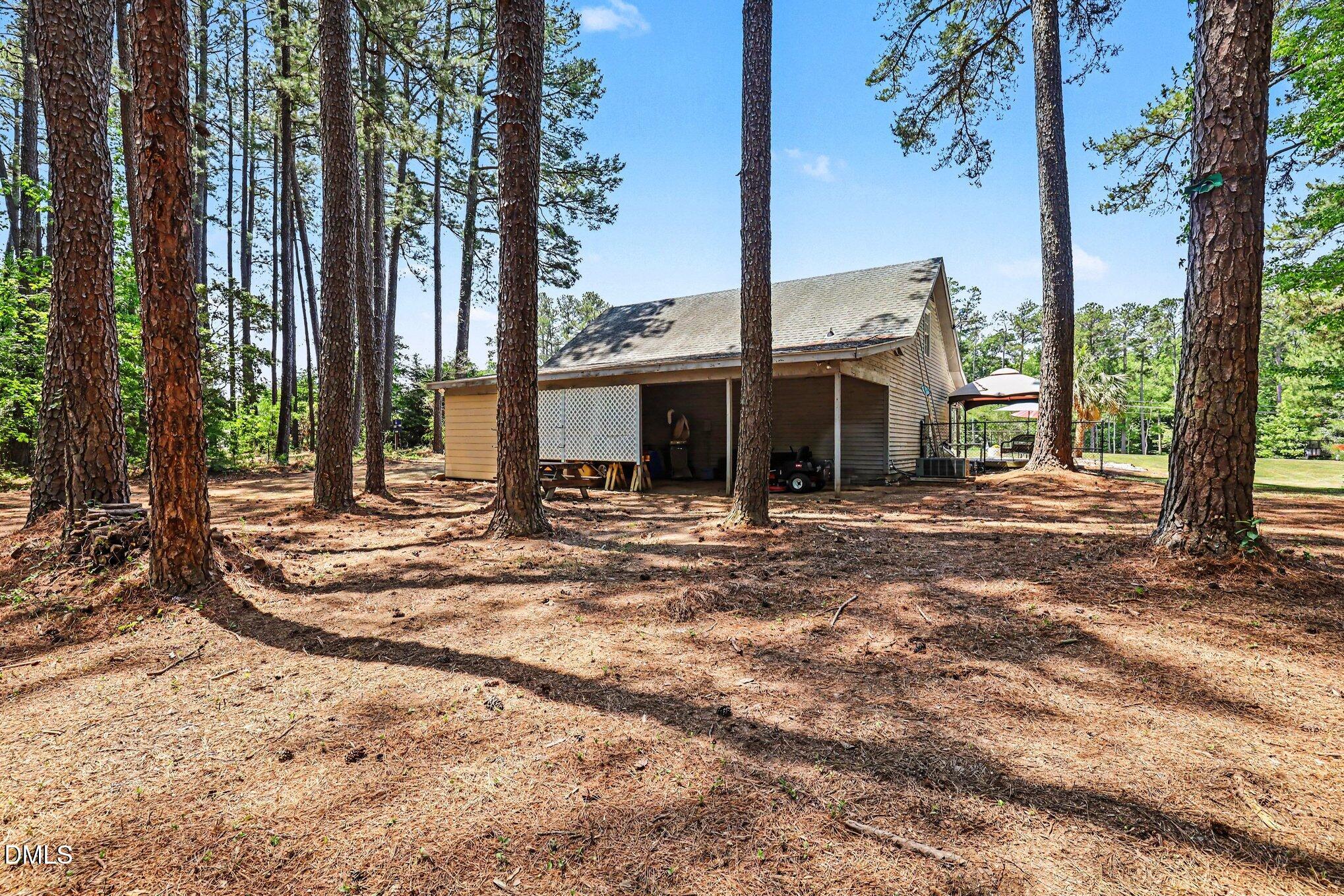 2256 Shotwell Road Clayton, NC 27520 - Photo 57 of 74 Garage Carport