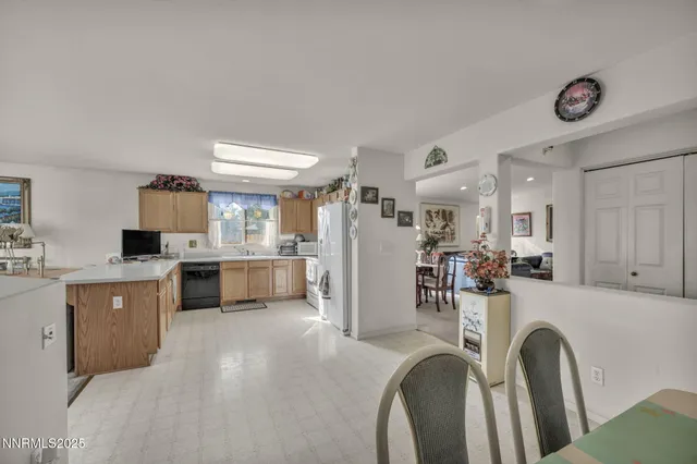 a view of a livingroom with furniture and windows