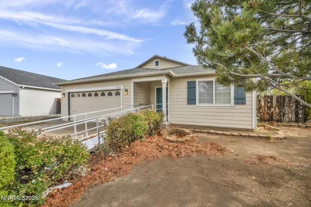 a house with trees in the background