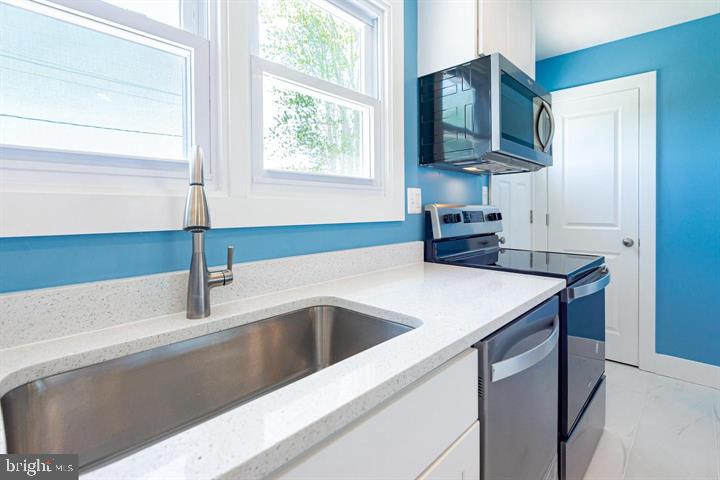 105 Meadow Road Bel Air, MD 21014 - Photo 13 of 36 Large sink with window overlooking backyard
