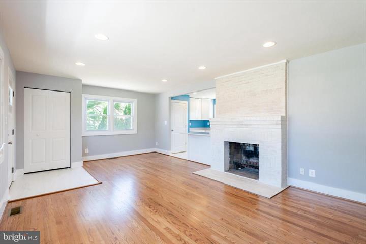 105 Meadow Road Bel Air, MD 21014 - Photo 6 of 36 Hardwood floors with a beautiful fireplace