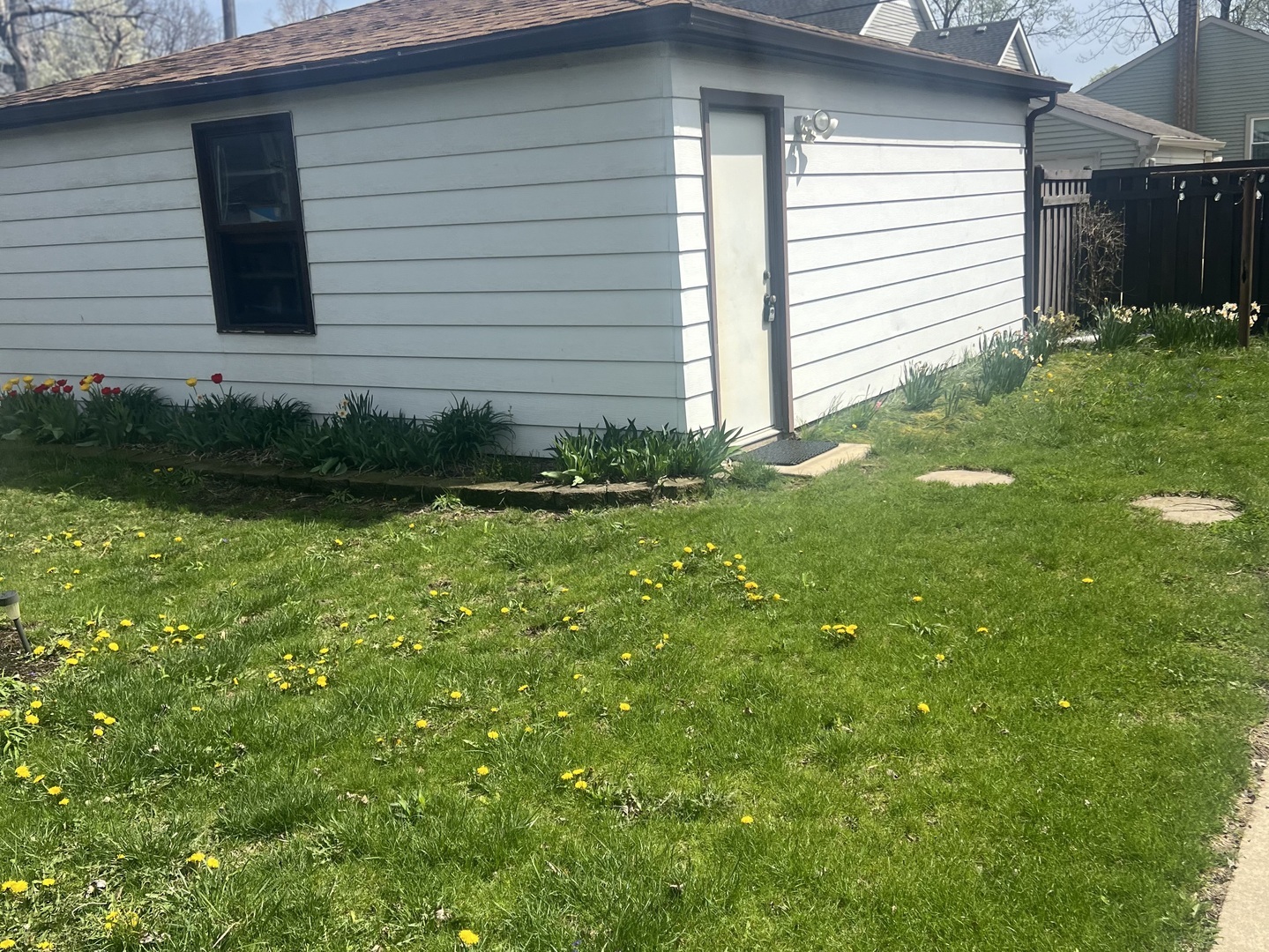 17831 Walter Street Lansing, IL 60438 - Photo 7 of 11 a front view of a house with garden