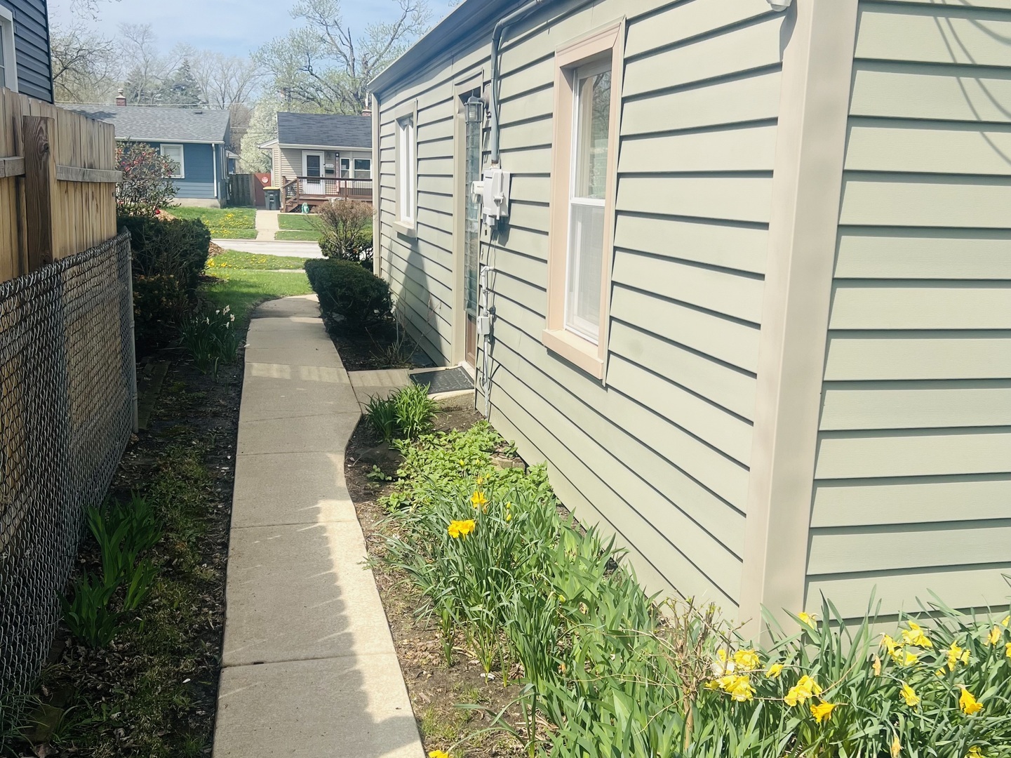 17831 Walter Street Lansing, IL 60438 - Photo 8 of 11 a view of a pathway with a house