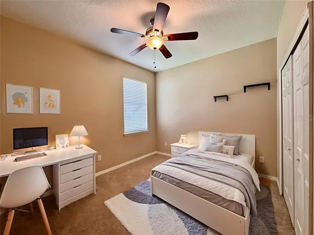 a spacious bathroom with a sink a mirror and a bathtub