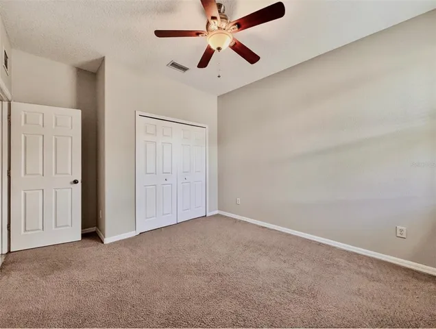 a view of a garden in front of a house