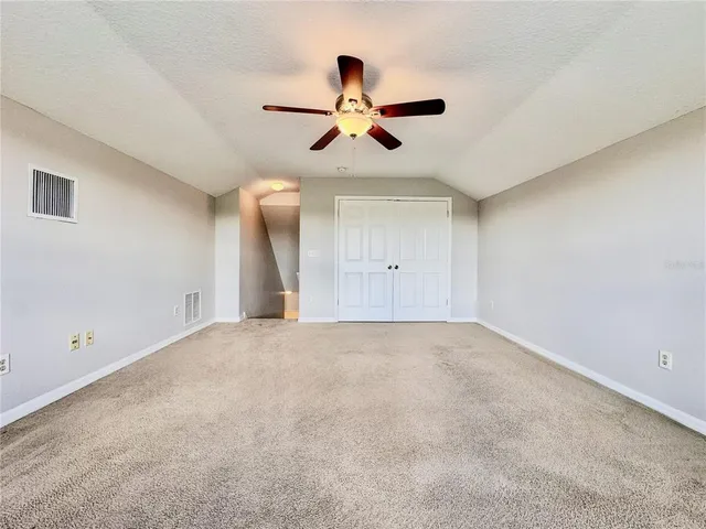 an aerial view of a house having yard