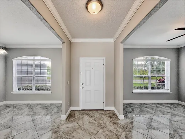 an empty room with windows