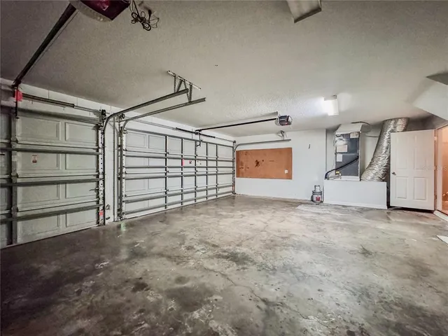 a view of a fountain in front of a house