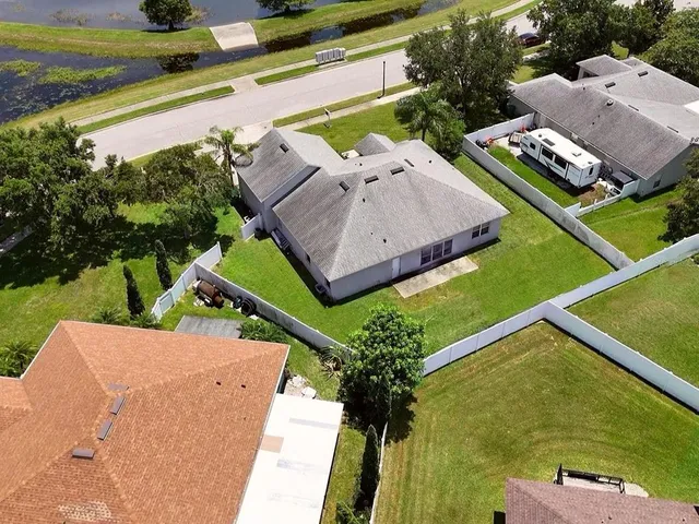 an aerial view of a building with outdoor space