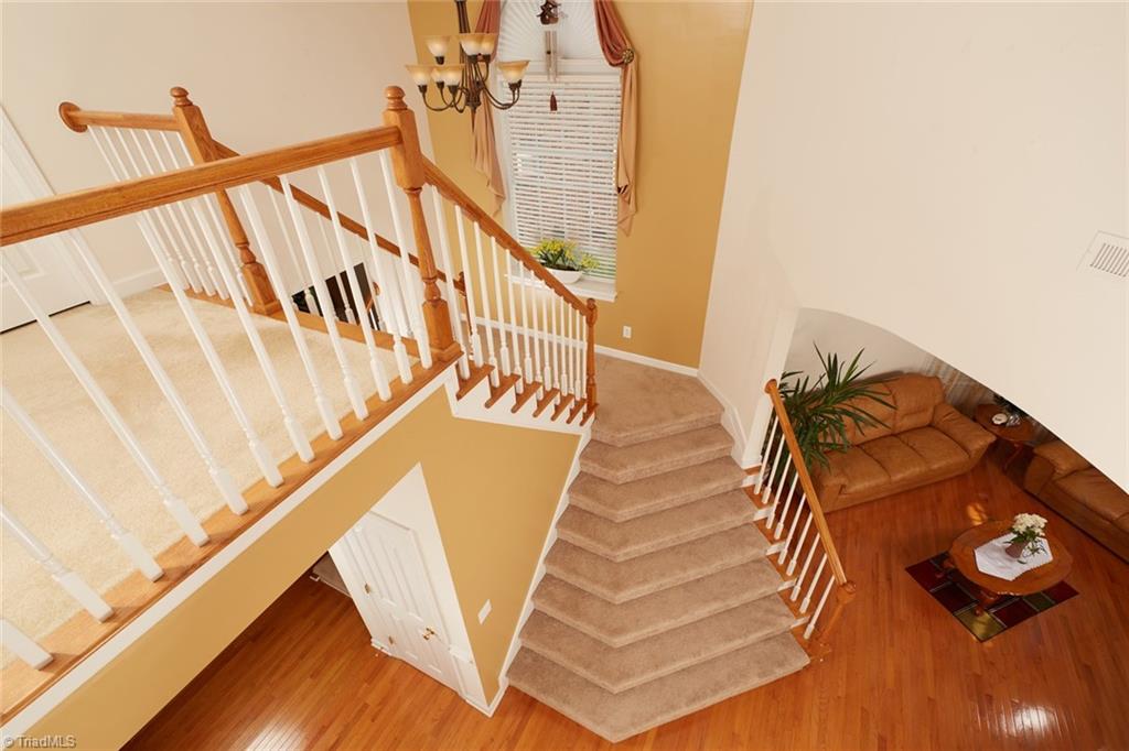 8144 Glengarriff Road Clemmons, NC 27012 - Photo 22 of 45 Dramatic Foyer with double stairs