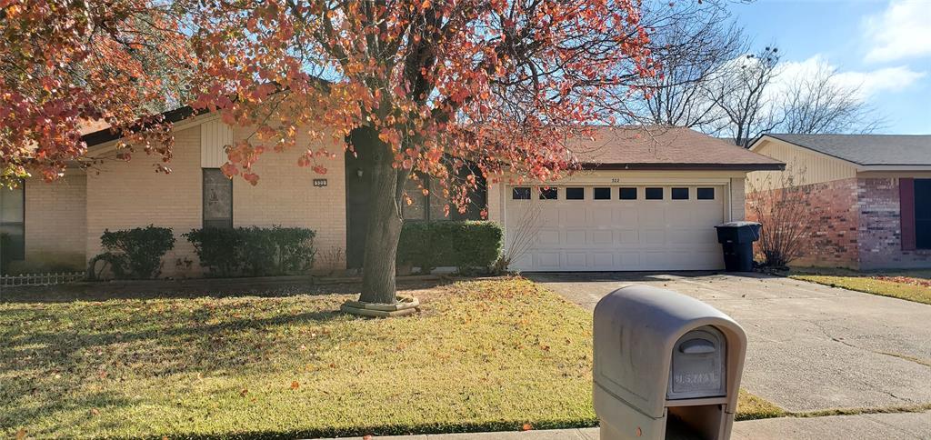 522 Rugby Place Bossier City, LA 71111 - Photo 1 of 1 a front view of a house with a yard garage and outdoor seating