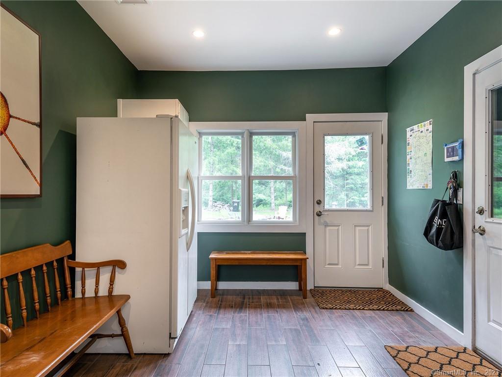 23 Cornwall Road Warren, CT 06754 - Photo 36 of 39 mudroom with door to outdoor patio and firepit