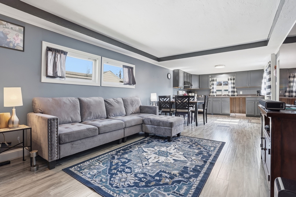 181 Boston Post Road East, Unit 34 Marlborough, MA 01752 - Photo 11 of 29 a living room with furniture and view of kitchen