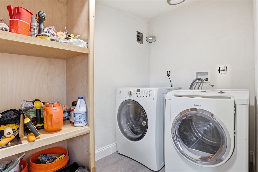 181 Boston Post Road East, Unit 34 Marlborough, MA 01752 - Photo 15 of 29 a utility room with dryer and washer