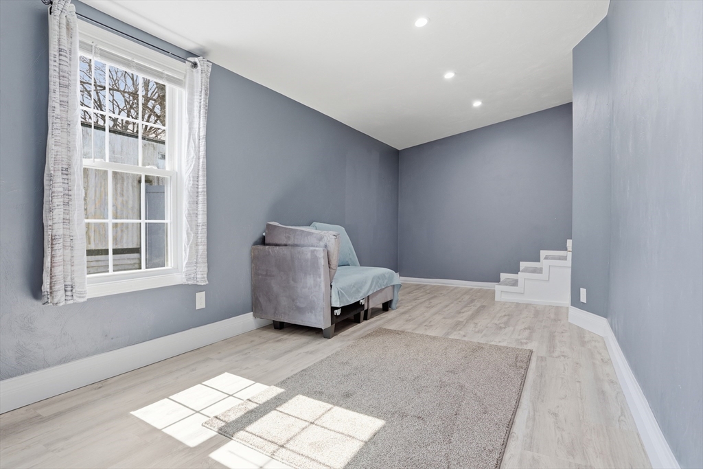 181 Boston Post Road East, Unit 34 Marlborough, MA 01752 - Photo 18 of 29 a bedroom with a bed and next to a window