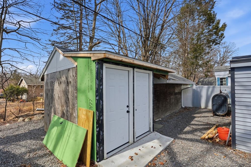 181 Boston Post Road East, Unit 34 Marlborough, MA 01752 - Photo 20 of 29 a backyard of a house with seating space