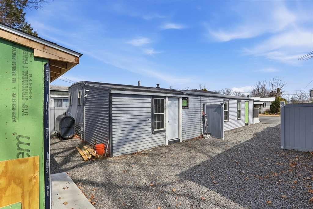 181 Boston Post Road East, Unit 34 Marlborough, MA 01752 - Photo 21 of 29 a view of a house with backyard