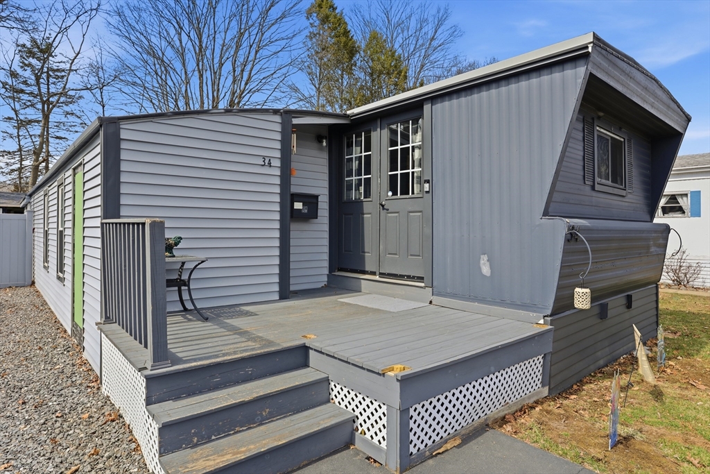 181 Boston Post Road East, Unit 34 Marlborough, MA 01752 - Photo 23 of 29 a view of backyard of house