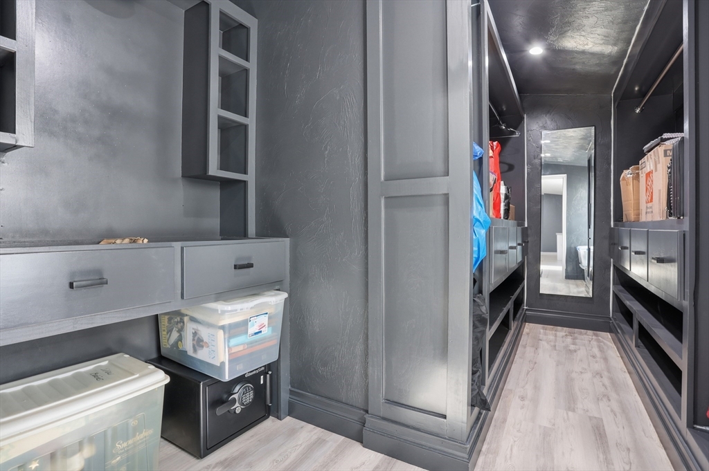 181 Boston Post Road East, Unit 34 Marlborough, MA 01752 - Photo 26 of 29 a view of hallway with washer and dryer