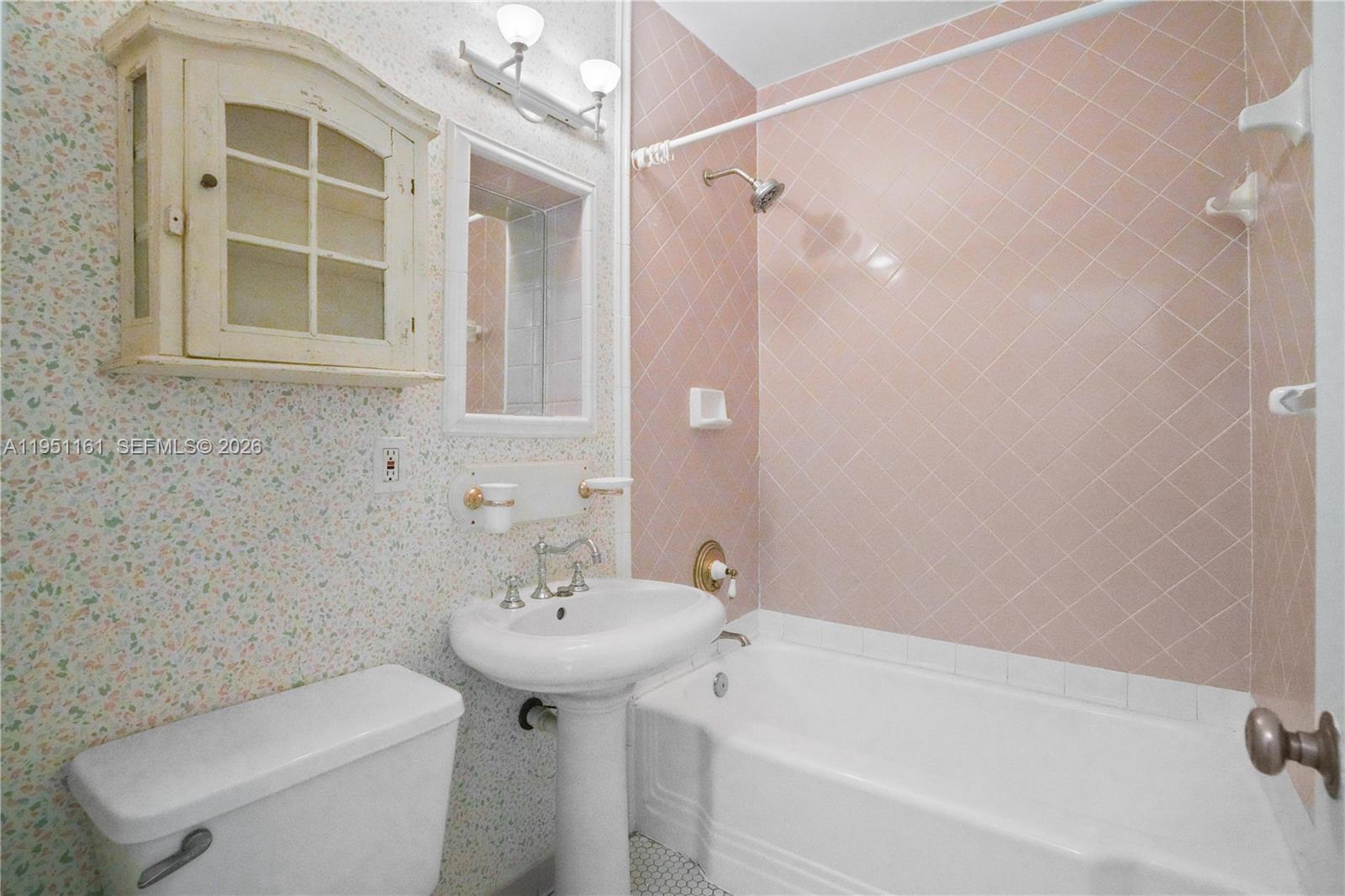 1413 El Rado Street Coral Gables, FL 33134 - Photo 20 of 20 a bathroom with a sink a toilet and shower