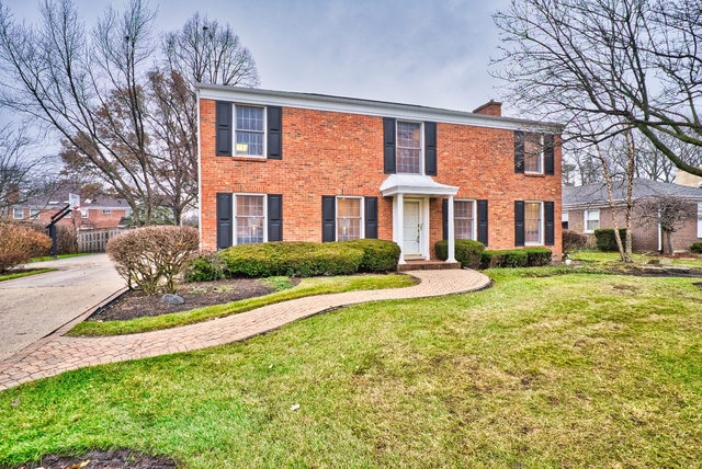 4052 Michelline Lane Northbrook, IL 60062 - Photo 1 of 44 a front view of a house with a yard