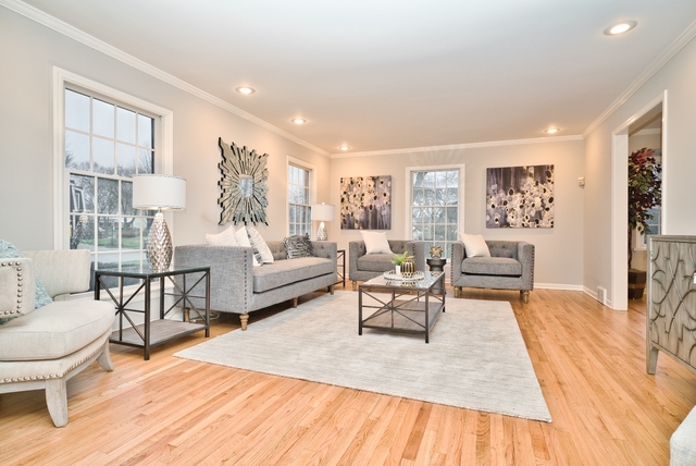 4052 Michelline Lane Northbrook, IL 60062 - Photo 2 of 44 a living room with furniture and a wooden floor