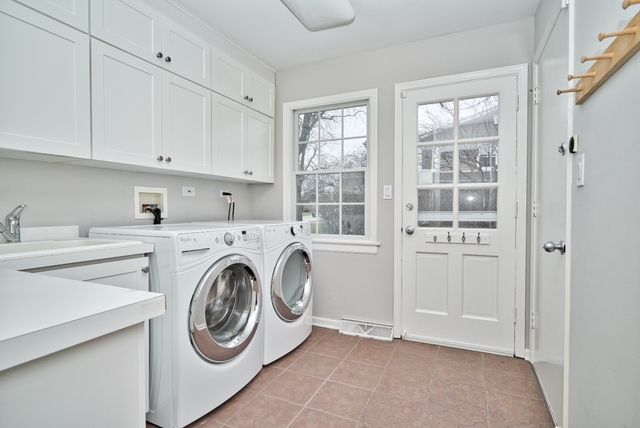 4052 Michelline Lane Northbrook, IL 60062 - Photo 19 of 44 a utility room with dryer and washer