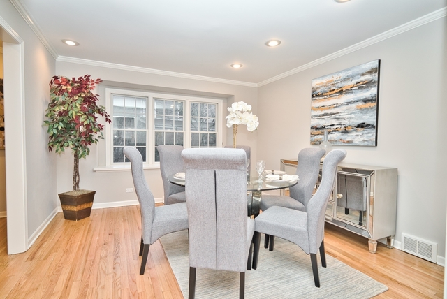 4052 Michelline Lane Northbrook, IL 60062 - Photo 20 of 44 a view of a dining room with furniture window and outside view