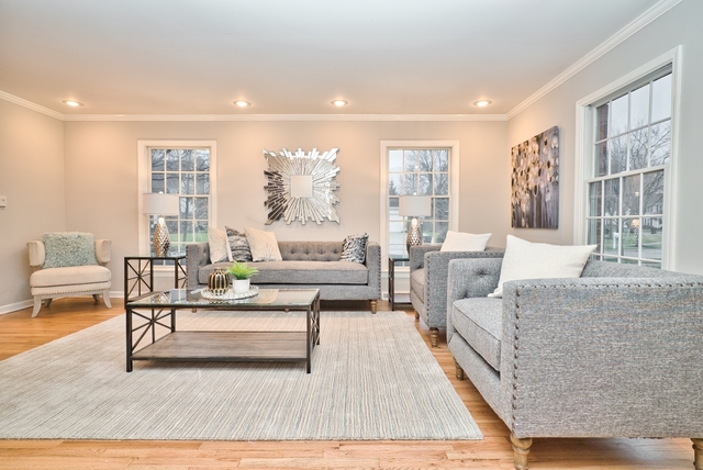 4052 Michelline Lane Northbrook, IL 60062 - Photo 3 of 44 a living room with furniture and a large window
