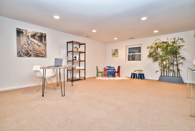 4052 Michelline Lane Northbrook, IL 60062 - Photo 24 of 44 a view of a livingroom with furniture and a potted plant